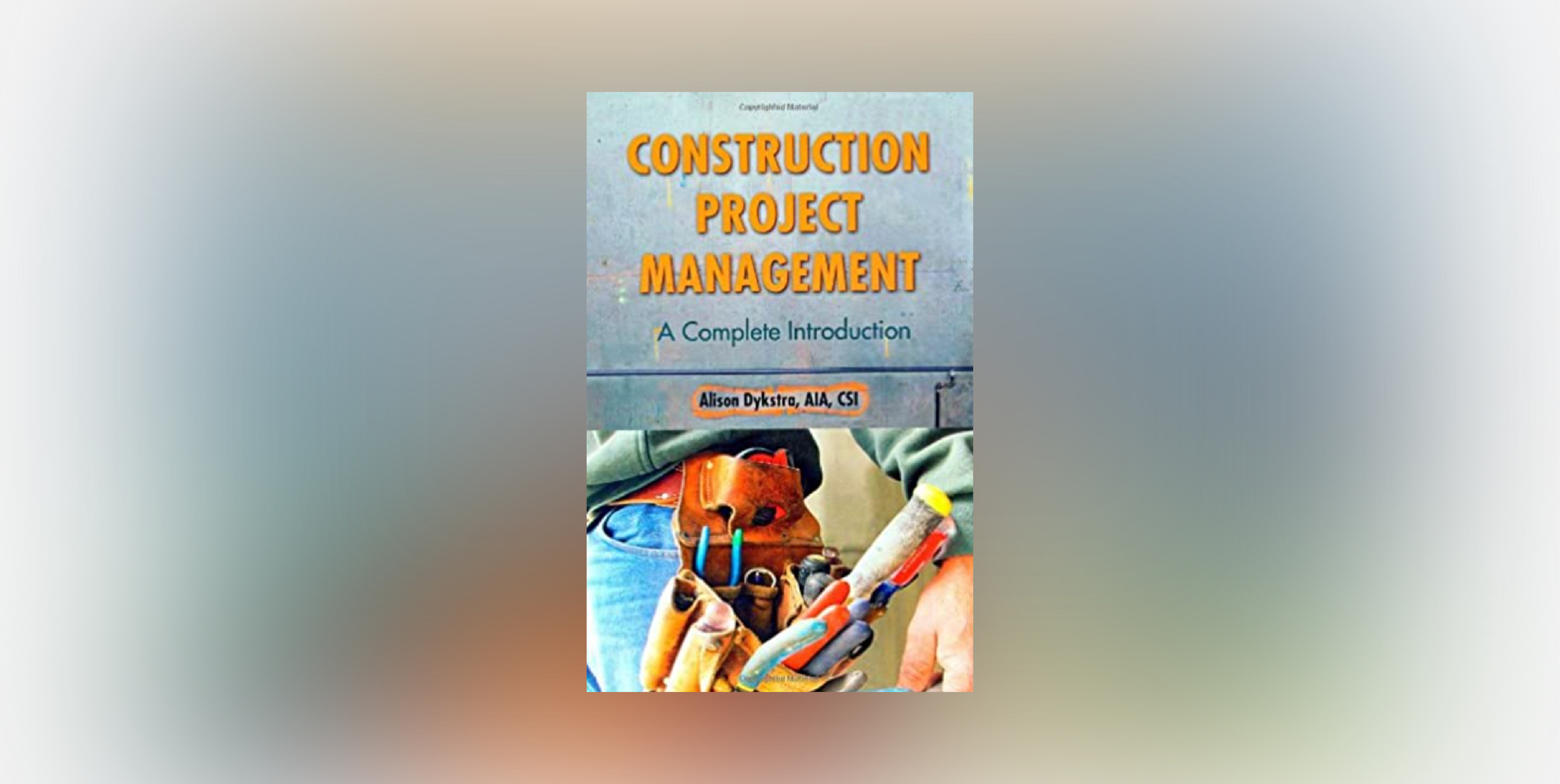 construction project management a complete introduction on blue background